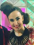 Cristina Rodríguez con doble moño