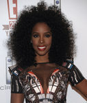 Kelly Rowland con el pelo muy cardado