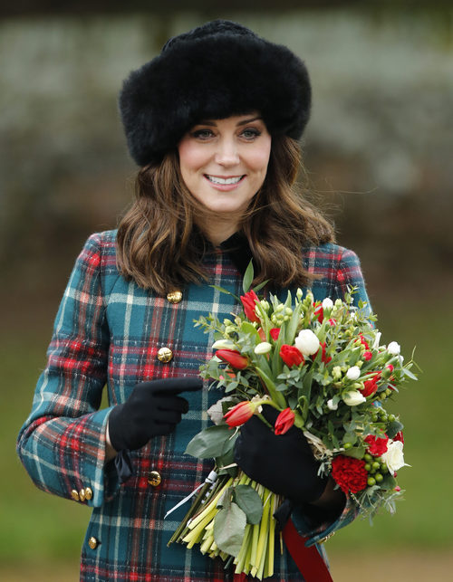 La Duquesa de Cambrige con un gorro de estilo ruso para la comida de Navidad