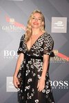 Sienna Miller con el pelo ondulado en la fiesta de Hugo Boss en Roma 2018