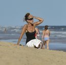 Sarah Jessica Parker con un moño alto y rápido en la playa