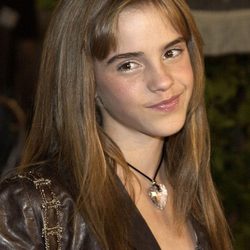 Emma Watson de niña con un look muy natural un tanto liso