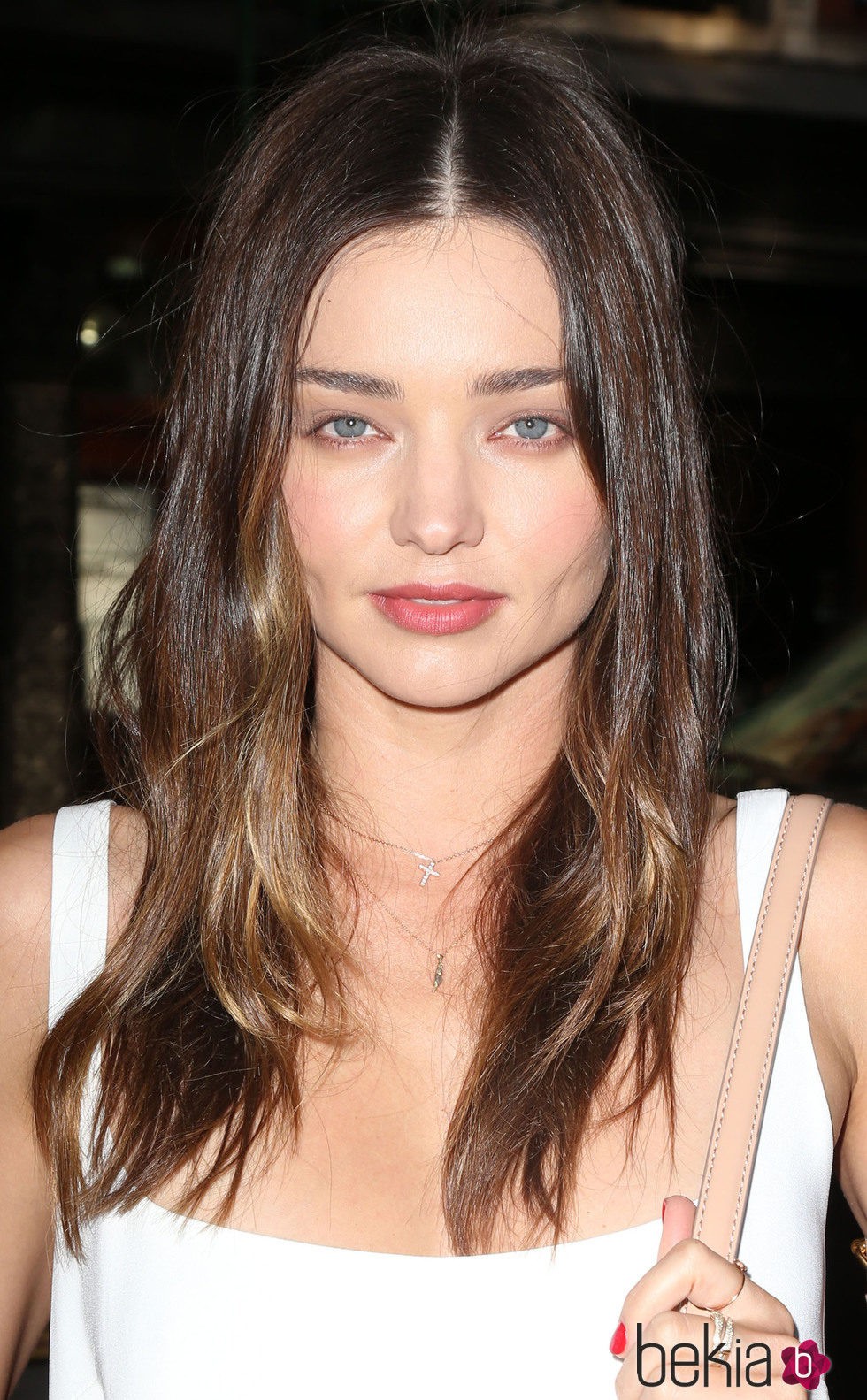 Miranda Kerr con un gesto apagado y cansado