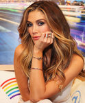 Delta Goodrem con la melena semiondulada en un encuentro con fans en Sydney
