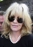 Melanie Griffith con el cabello sin peinar
